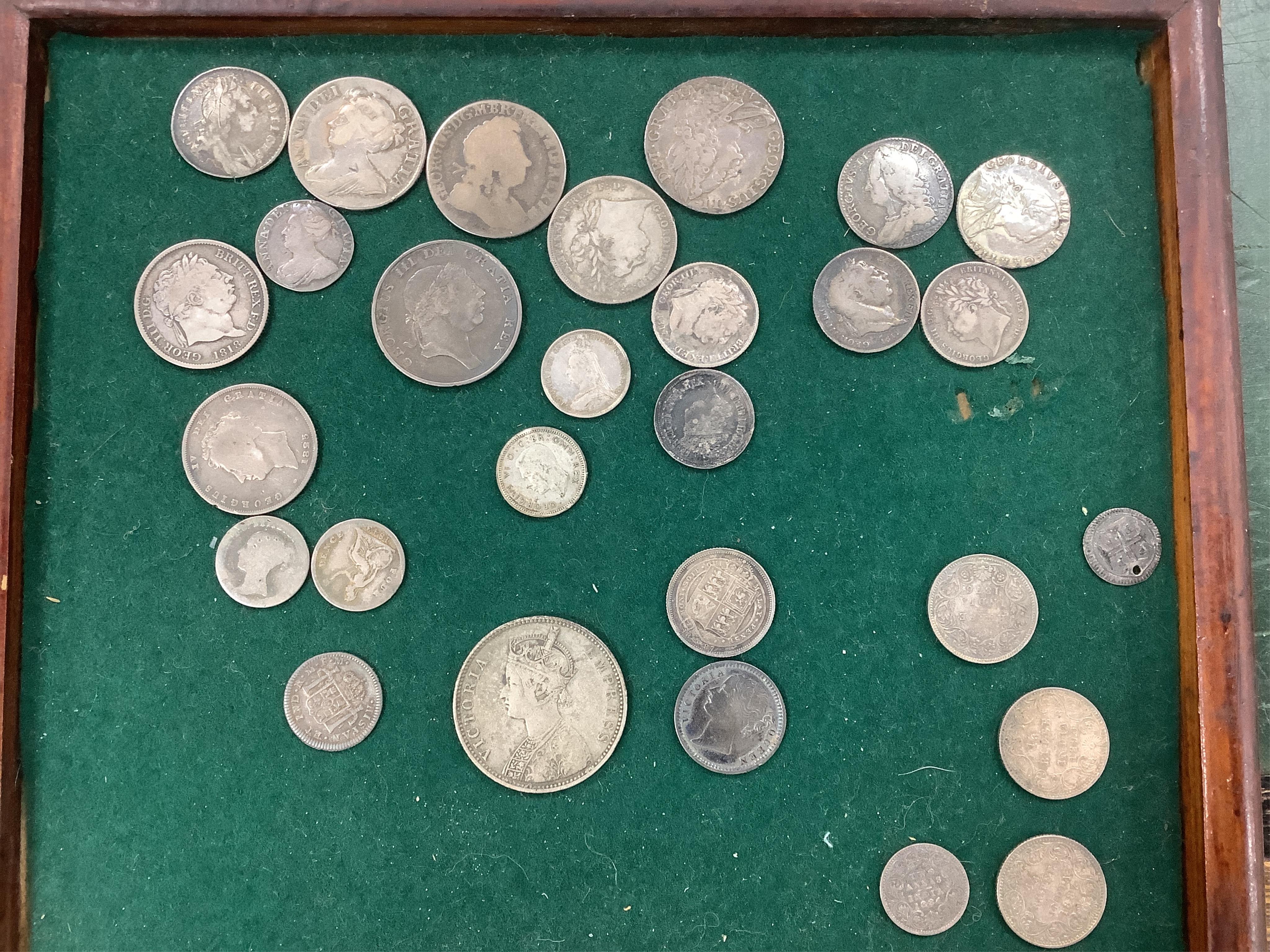 British silver coins, William III to Victoria, to include 1696 sixpence, 1709 shilling, fine, 1713 3d, fine, 1723 shilling, VG, 1813 bank token 1s 6d, various 3d to shillings, together with British India silver coins; 1